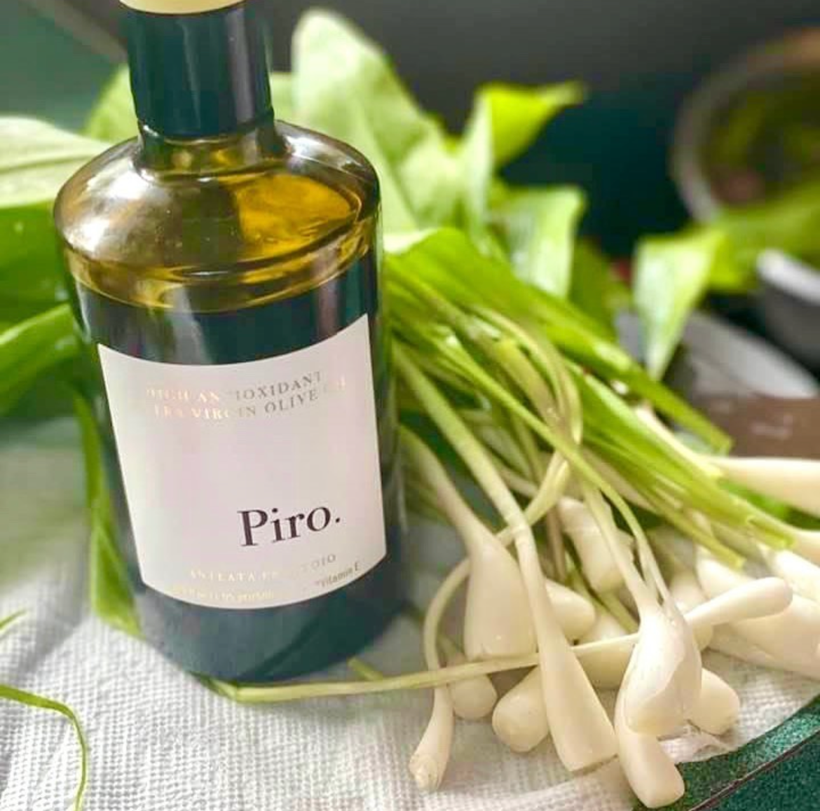 Ail des ours poêlé à l'huile d'olive et zeste de citron
