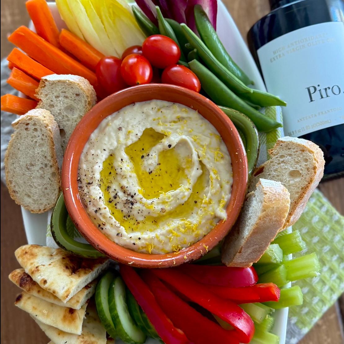 Crème de haricots blancs au citron, filet d'huile d'olive Piro